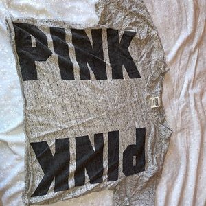 Grey shirt with PINK written down both sides
